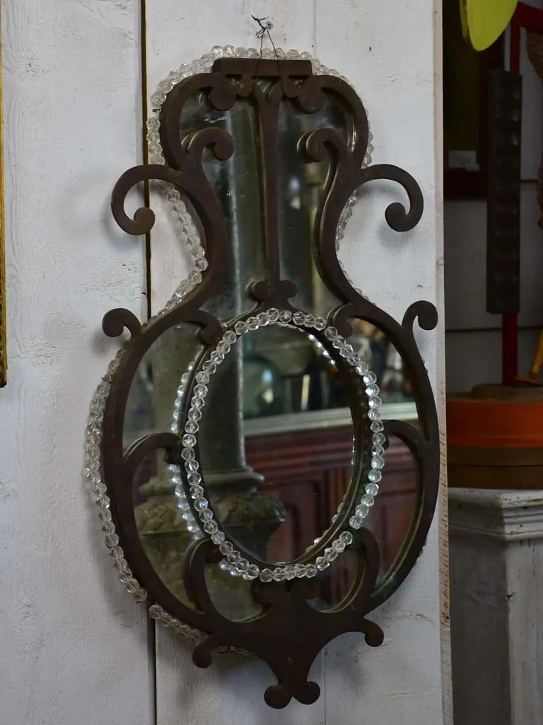 Pair of early 19th-century wrought iron Italian mirrors with beading